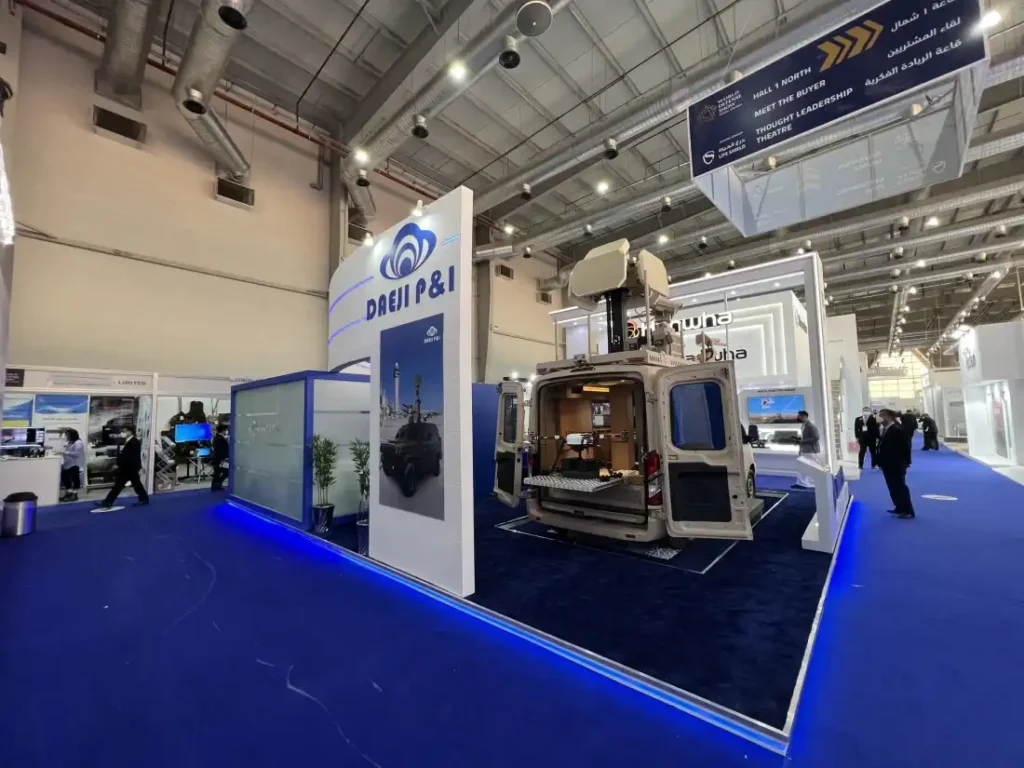 DAEJI P&I surveillance vehicle displayed at an international defense exhibition stand
