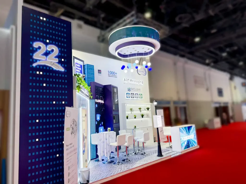 Broad Net exhibition stand with digital displays and A2P messaging branding