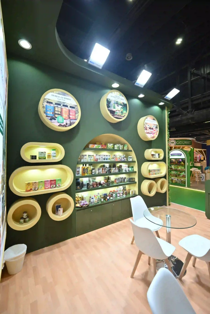 Custom exhibition booth interior featuring circular niches and illuminated product displays