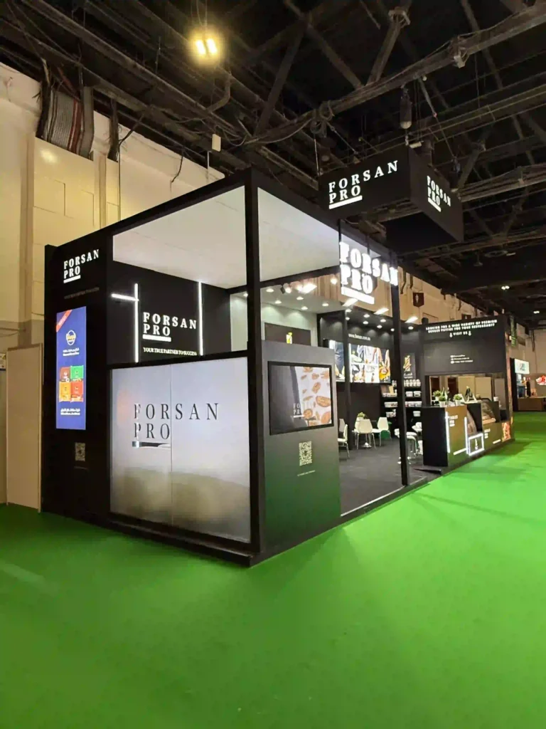 Wide view of Forsan Pro custom exhibition stand with branded displays and meeting area