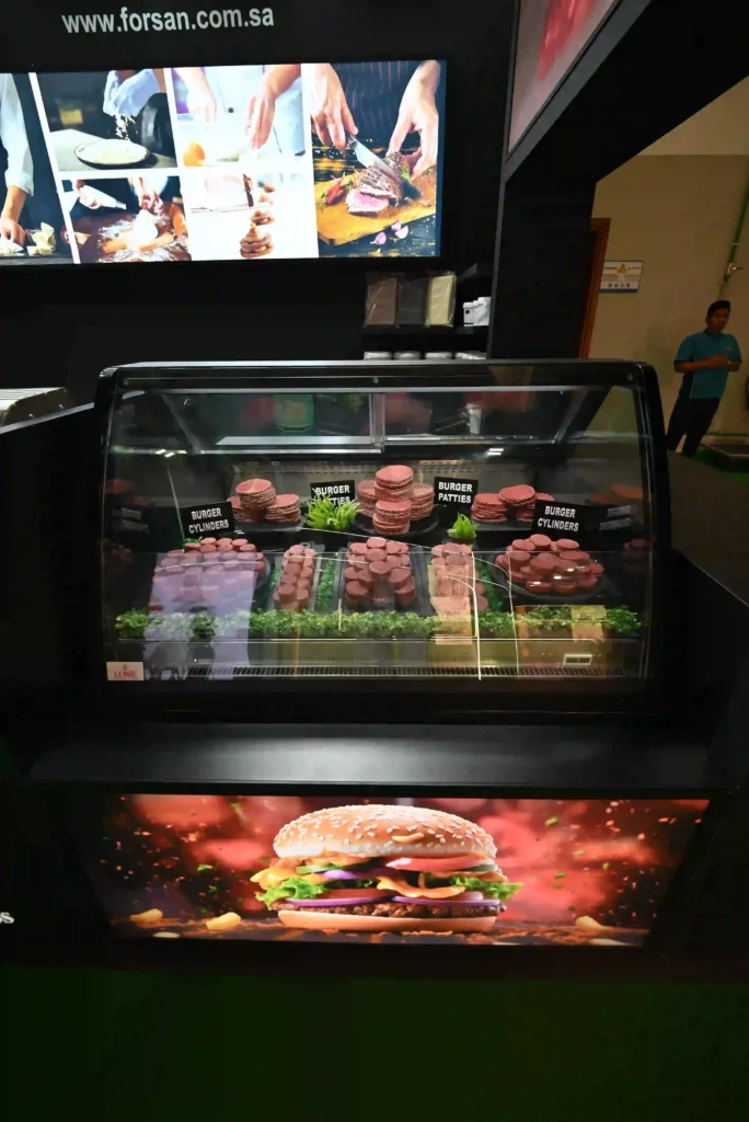 Close-up of refrigerated meat display within the Forsan Pro exhibition stand.