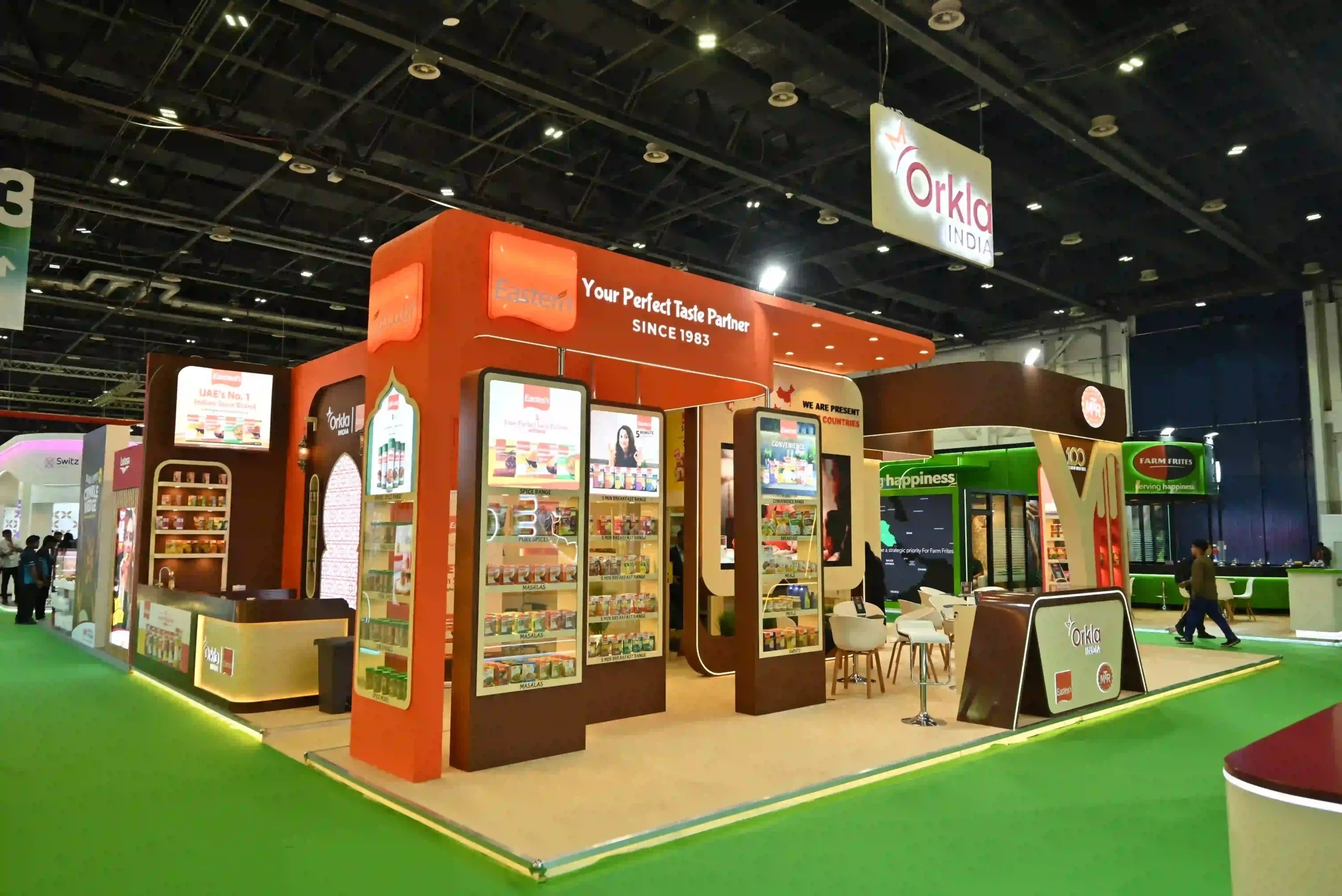 Custom exhibition stand for Orkla India showcasing food products at a trade show