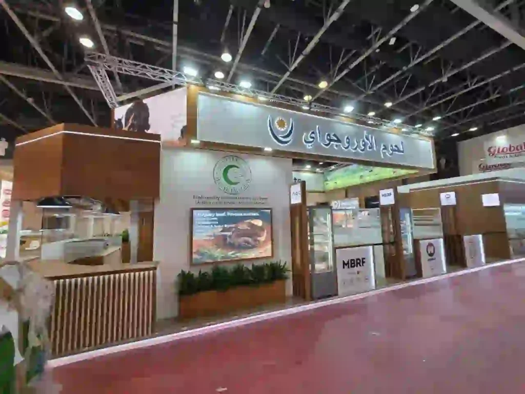 Uruguay Meats custom exhibition stand featuring illuminated signage and product displays
