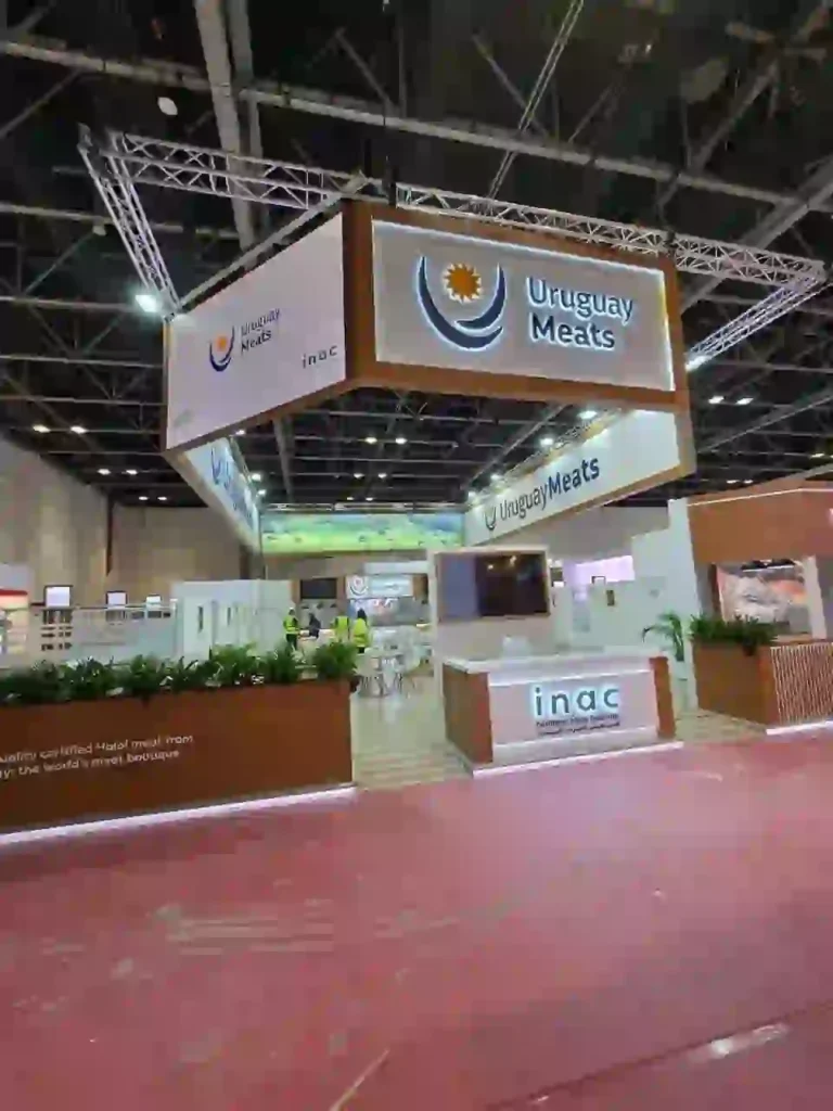 Custom exhibition stand for Uruguay Meats with suspended branding and reception area