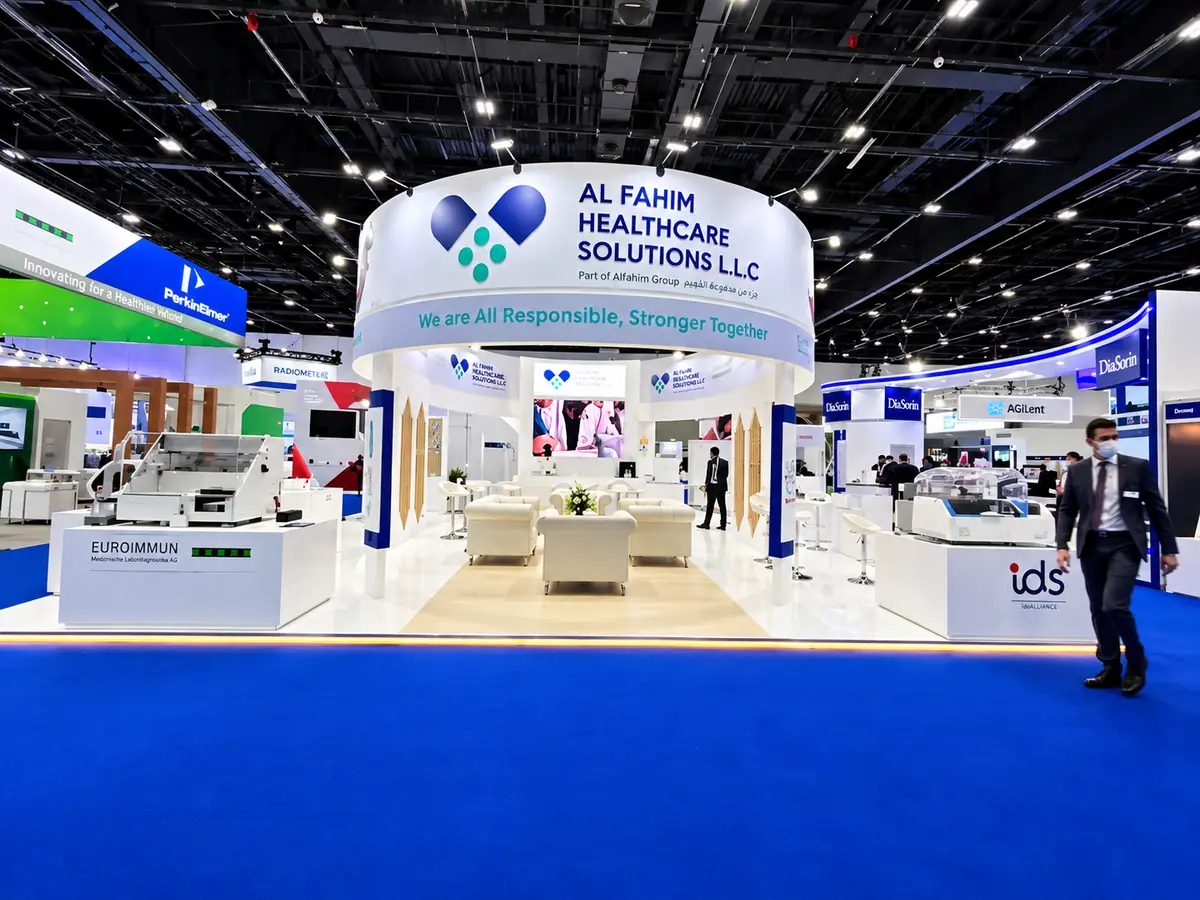 Al Fahim Healthcare Solutions custom healthcare exhibition stand with modern curved design